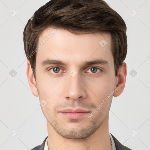 Neutral white young-adult male with short  brown hair and grey eyes