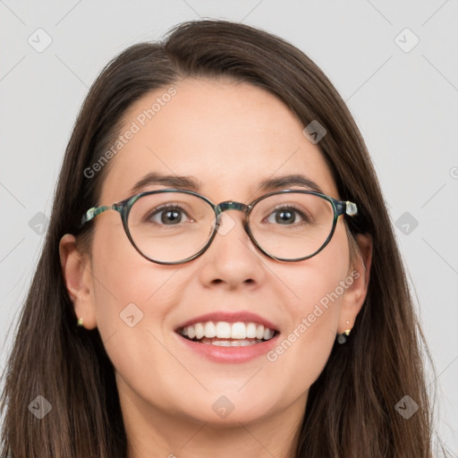 Joyful white young-adult female with long  brown hair and grey eyes