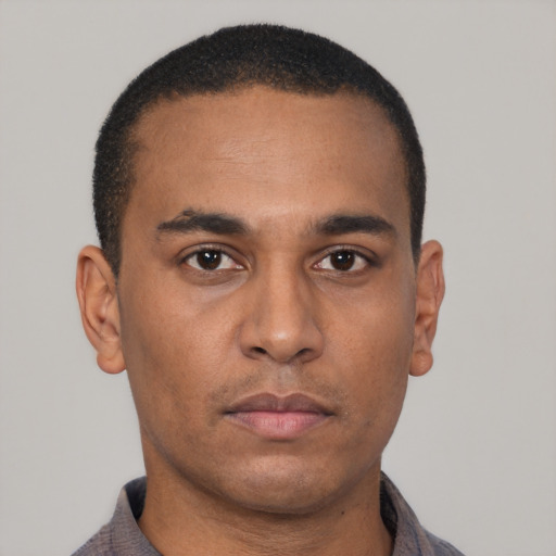 Neutral latino young-adult male with short  brown hair and brown eyes