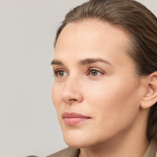 Neutral white young-adult female with medium  brown hair and brown eyes