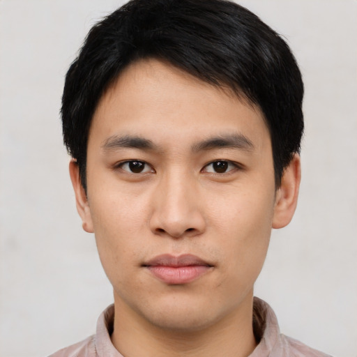Neutral asian young-adult male with short  black hair and brown eyes