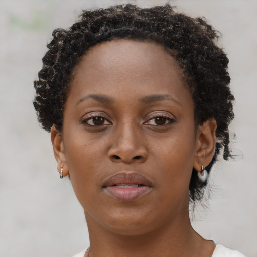 Neutral black young-adult female with short  brown hair and brown eyes