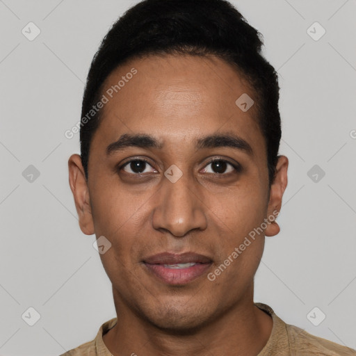 Joyful latino young-adult male with short  black hair and brown eyes