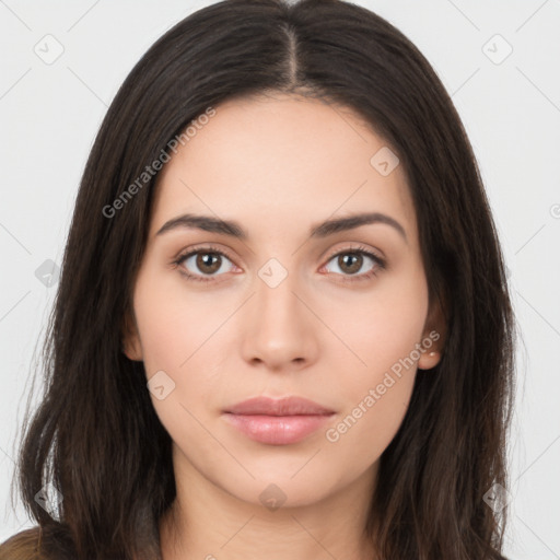 Neutral white young-adult female with long  brown hair and brown eyes