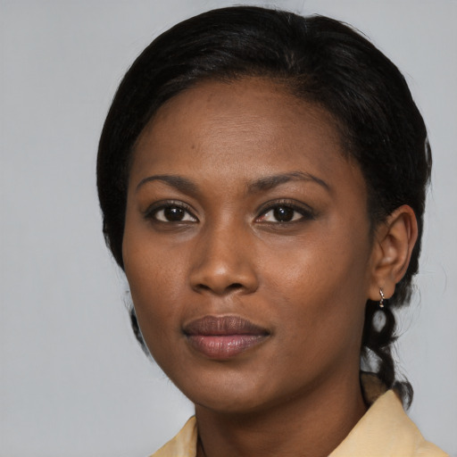 Neutral black young-adult female with medium  black hair and brown eyes