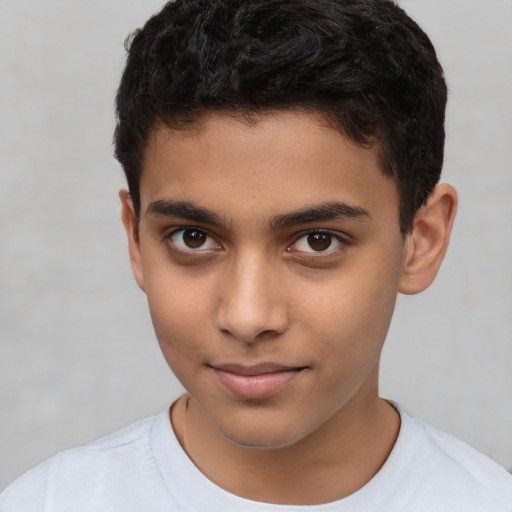 Joyful latino young-adult male with short  brown hair and brown eyes