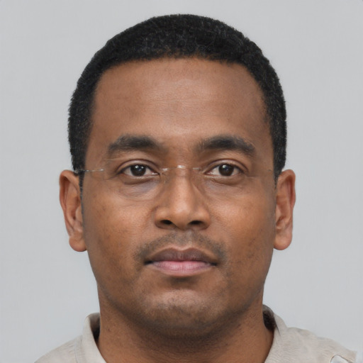 Neutral black young-adult male with short  black hair and brown eyes