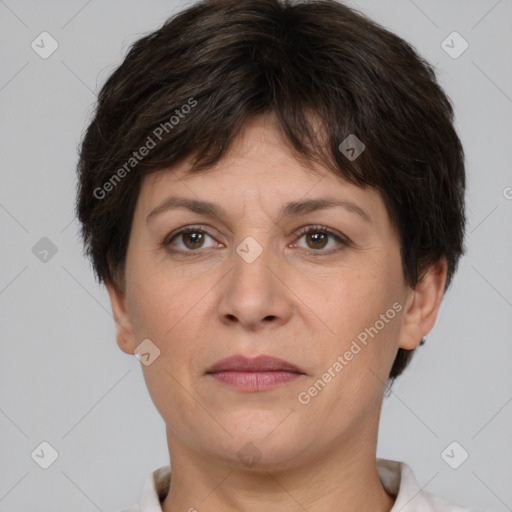 Joyful white adult female with short  brown hair and brown eyes