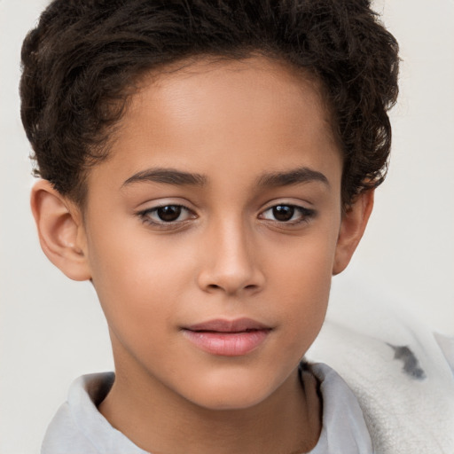 Joyful white child female with short  brown hair and brown eyes