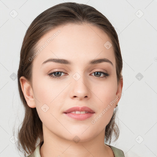 Neutral white young-adult female with medium  brown hair and grey eyes