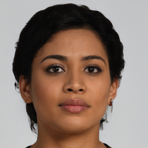 Neutral latino young-adult female with short  black hair and brown eyes