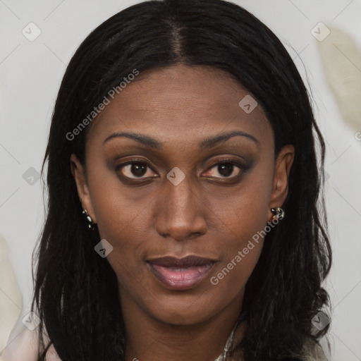 Joyful black young-adult female with long  brown hair and brown eyes