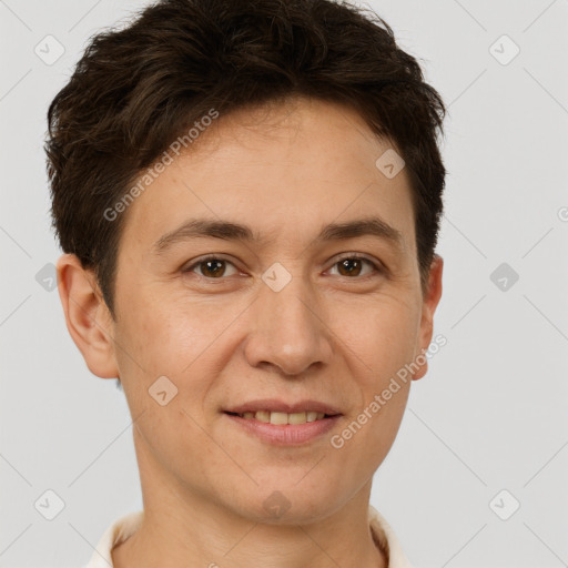 Joyful white adult female with short  brown hair and brown eyes