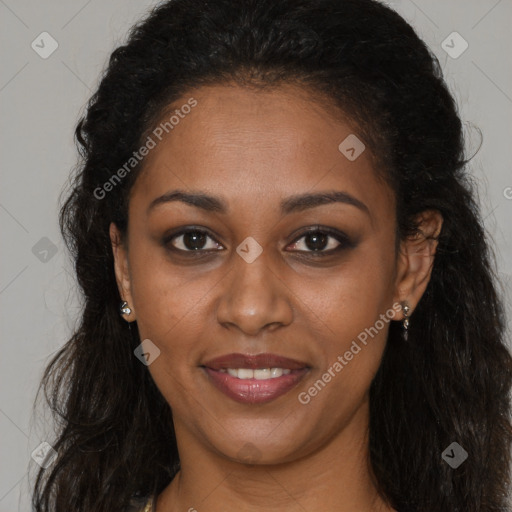 Joyful black young-adult female with long  brown hair and brown eyes