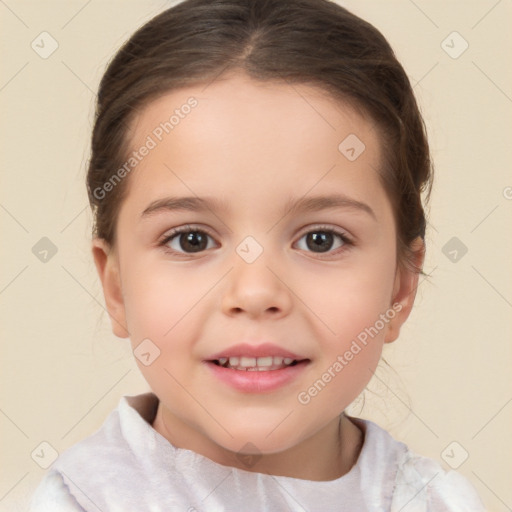 Joyful white child female with short  brown hair and brown eyes