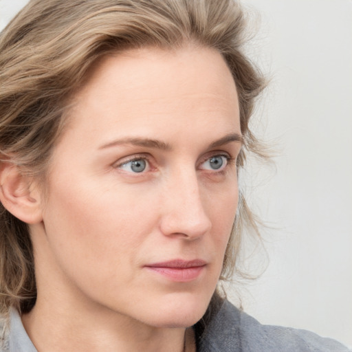 Neutral white young-adult female with medium  brown hair and blue eyes