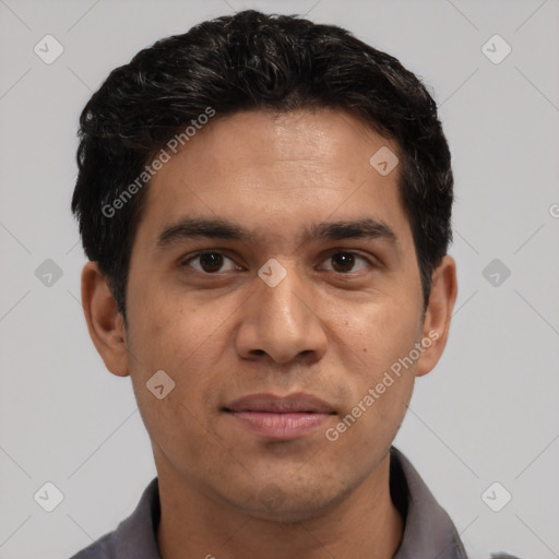 Joyful white young-adult male with short  black hair and brown eyes