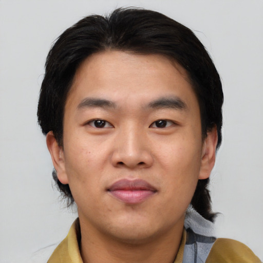 Neutral asian young-adult male with short  brown hair and brown eyes