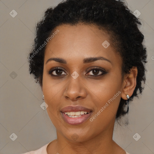 Joyful black young-adult female with long  brown hair and brown eyes