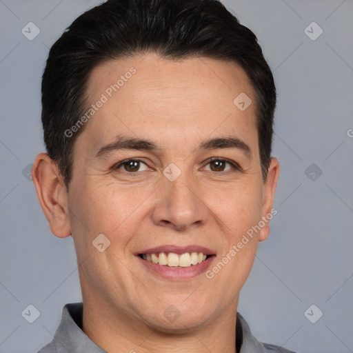 Joyful white adult male with short  brown hair and brown eyes