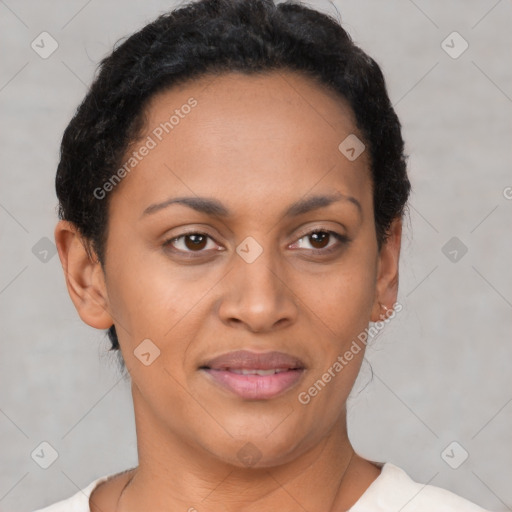 Joyful latino young-adult female with short  black hair and brown eyes