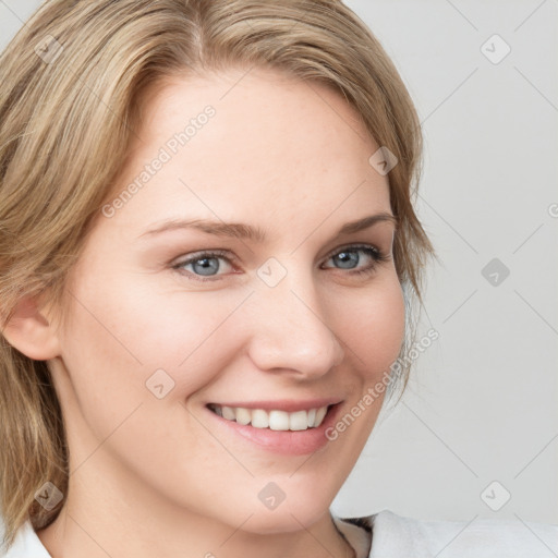 Joyful white young-adult female with medium  brown hair and blue eyes