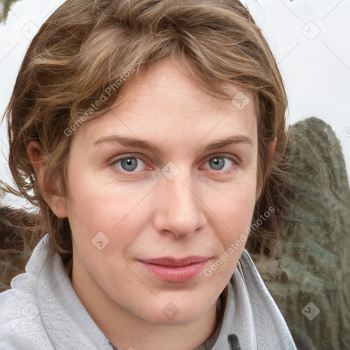 Joyful white young-adult female with medium  brown hair and blue eyes