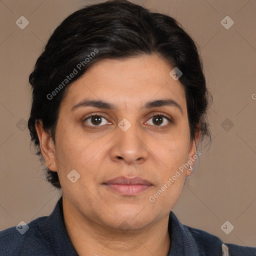 Joyful white adult female with medium  brown hair and brown eyes