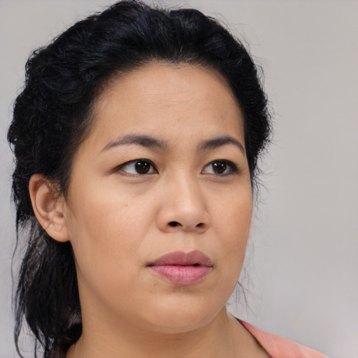 Neutral asian young-adult female with medium  brown hair and brown eyes