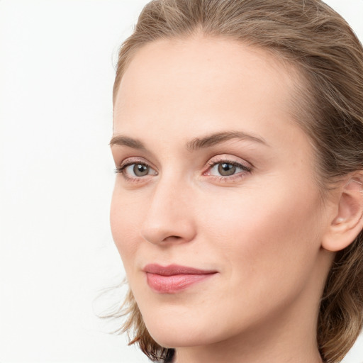 Neutral white young-adult female with long  brown hair and blue eyes