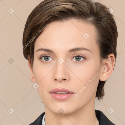 Neutral white young-adult female with medium  brown hair and brown eyes