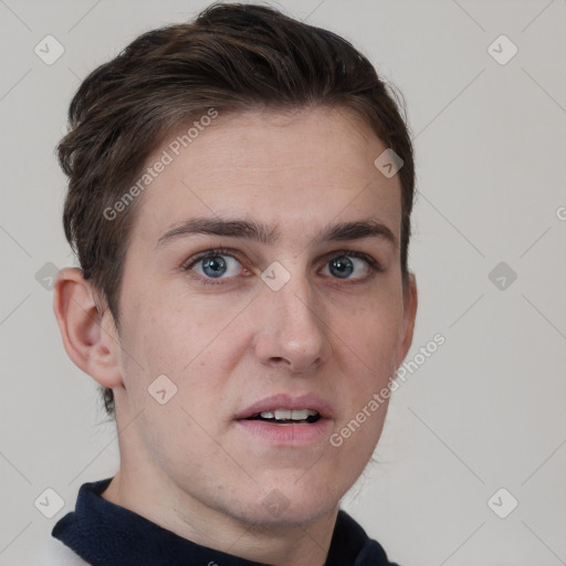 Neutral white young-adult male with short  brown hair and brown eyes