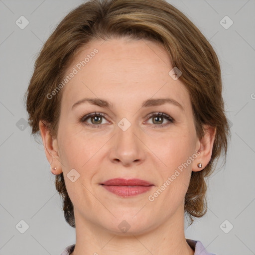 Joyful white adult female with medium  brown hair and grey eyes