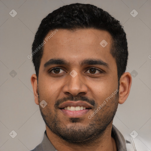 Joyful latino young-adult male with short  black hair and brown eyes