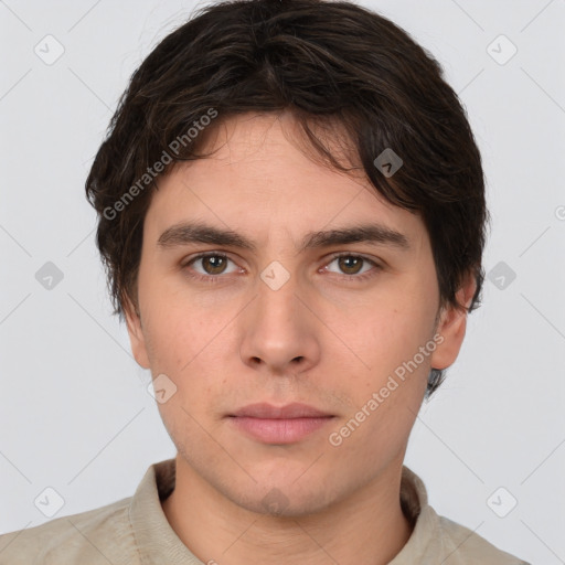 Neutral white young-adult male with short  brown hair and brown eyes