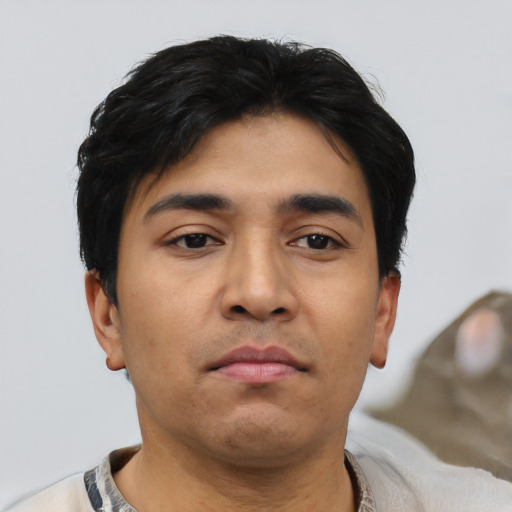 Neutral asian young-adult male with short  black hair and brown eyes