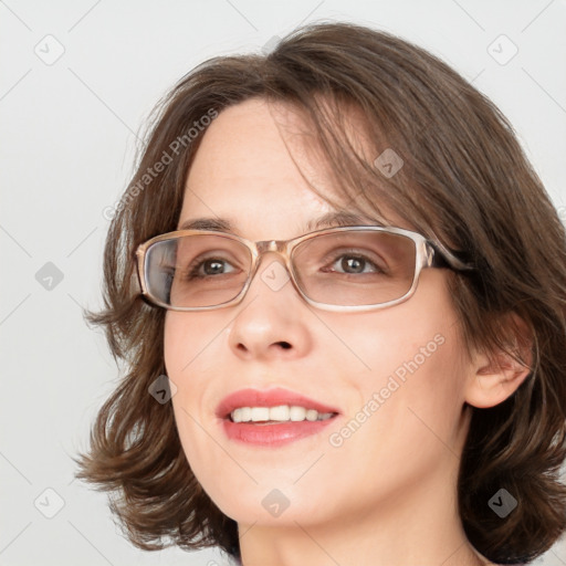 Joyful white young-adult female with medium  brown hair and blue eyes