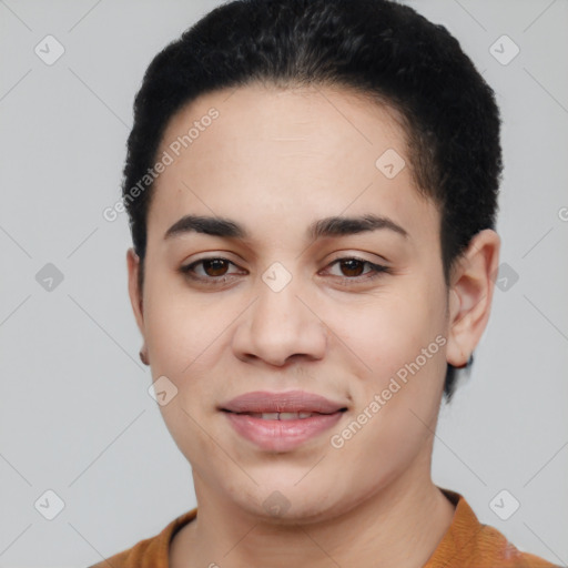 Joyful latino young-adult female with short  black hair and brown eyes