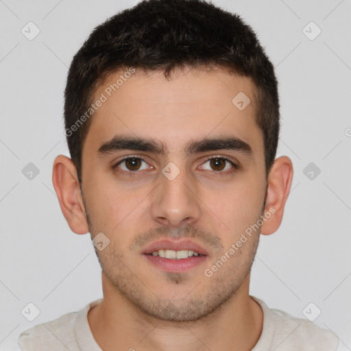 Joyful white young-adult male with short  brown hair and brown eyes