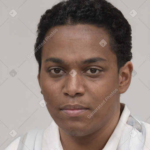 Neutral latino young-adult male with short  brown hair and brown eyes