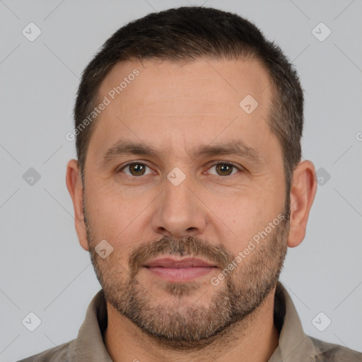 Joyful white adult male with short  brown hair and brown eyes