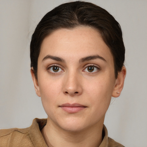 Neutral white young-adult female with short  brown hair and brown eyes