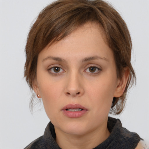 Neutral white young-adult female with medium  brown hair and brown eyes