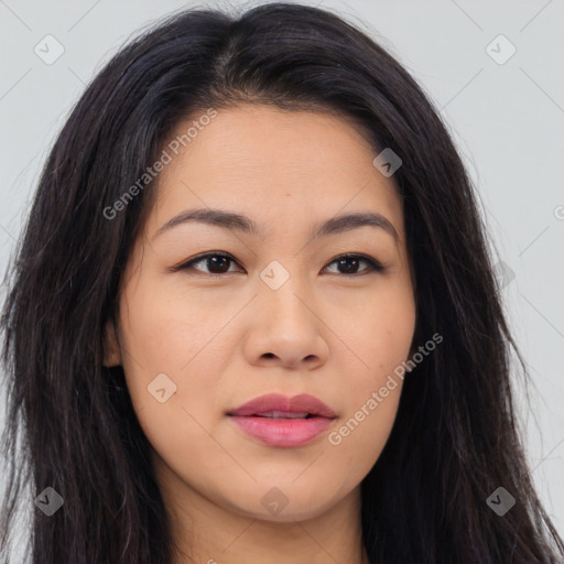 Joyful latino young-adult female with long  brown hair and brown eyes