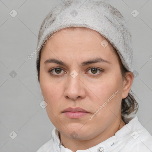 Neutral white young-adult female with medium  brown hair and brown eyes