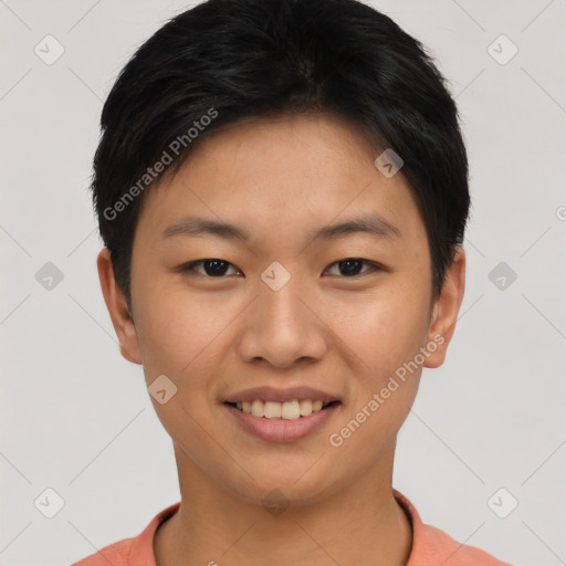 Joyful asian young-adult female with short  black hair and brown eyes