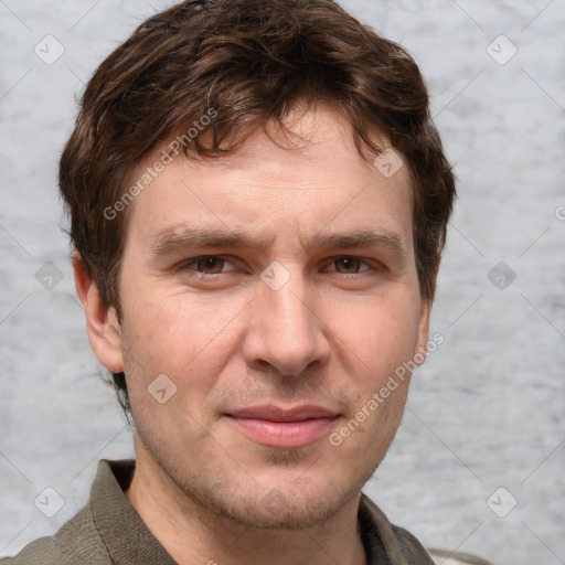 Joyful white adult male with short  brown hair and grey eyes