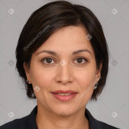 Joyful white adult female with medium  brown hair and brown eyes