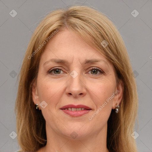 Joyful white adult female with medium  brown hair and grey eyes