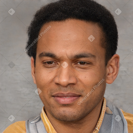 Joyful latino adult male with short  brown hair and brown eyes
